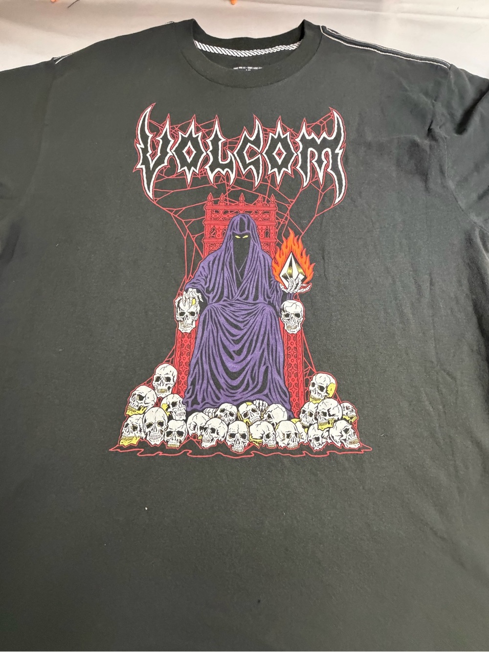 Volcom Black Graphic Tee with Purple Cloaked Figure and Red Accents